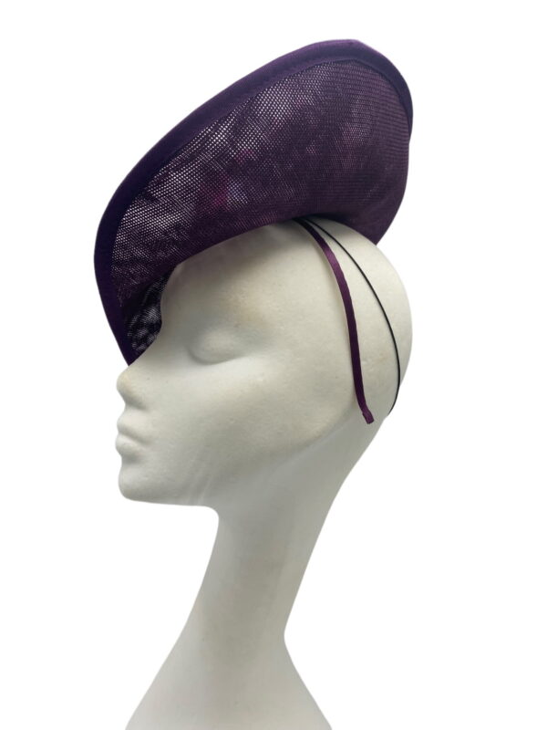 Stunning purple headpiece with an array of tonal flower details.